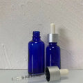 Fancy 50ml Cosmetic Packaging Round Blue Glass Dropper Bottles for Essential Oils Screen Printed for Skin Care Cream Serum Use