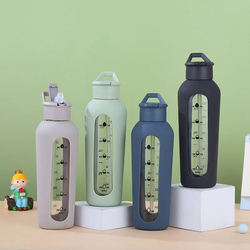 2023 New Products Tall and Thin 700ml 24oz Durable Borosilicate Glass Drinking Water Bottle With Handle and Silicone Sleeve