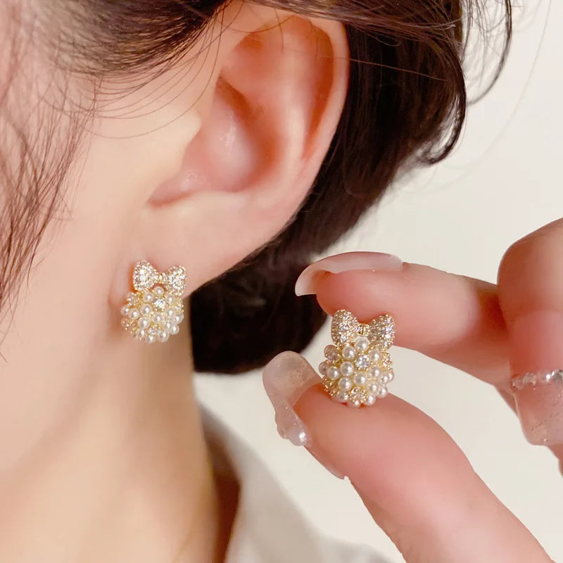 2024 Silver Needle Small and Delicate Micro-Inlaid Zircon Bow Pearl Earrings for Women
