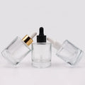 Skin Care Hair Oil Serum Bottle 30ml 50ml Flat Thick Bottom Glass Dropper Bottle with Gold Silver Cap