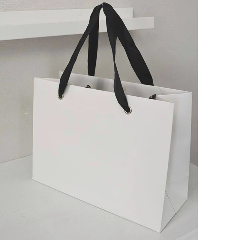 Wholesale Luxury Custom White Paper Bag Logo Printing Paperbag Shopping Gift Paper Bag With Ribbon Handle