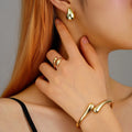 Fashion Women's Luxury Waterdrop Geometric Punk Jewelry Set Metal Smooth Spring Earrings Bracelet Ring Set