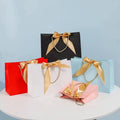 Custom Logo Luxury Clothes Jewelry Paper Shopping Gift Bags With Ribbon Bow Tie