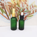 1oz Green Frosted Cylinder Glass Hair Oil Bottles Luxury with Custom Label