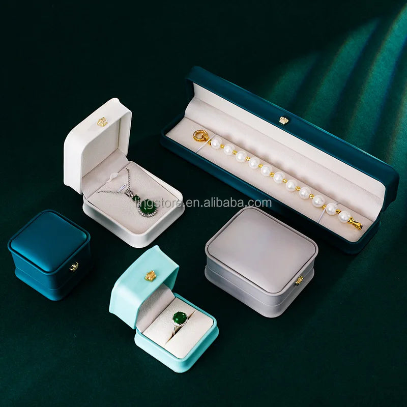 High-End PU Leather Crown Buckle Jewelry Storage Box Wholesale Ring Necklace Bracelet Package Case with Velvet Foam