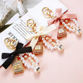 New Fashion Pearl Wristband Key Chain Personality Rhinestone Perfume Bottle Bow Keychain Cute Car Key Bag Pendant