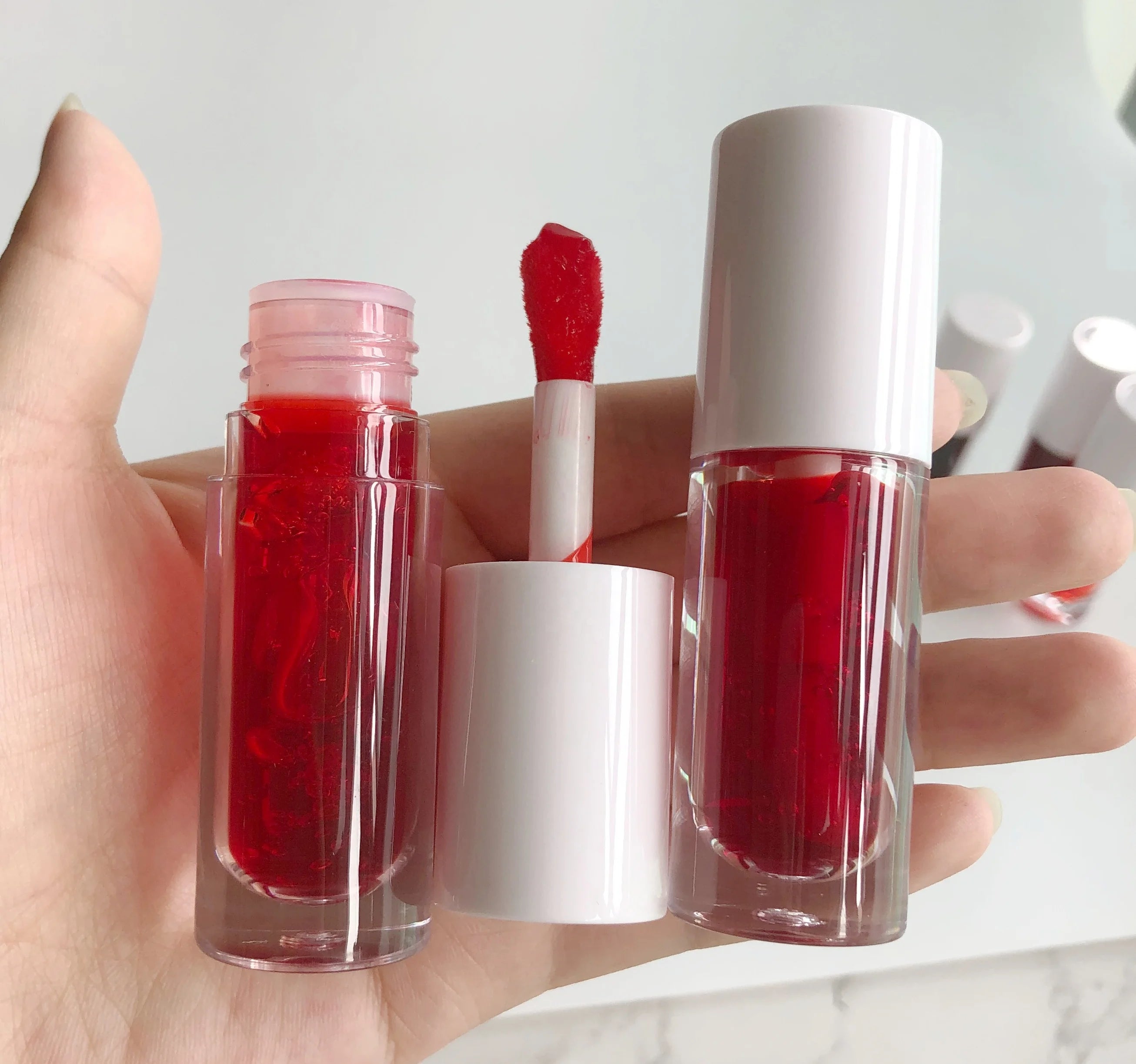 Custom Logo Waterproof Long Lasting Moisturizing Liquid Herbal Mineral Extreme Tinted Red Pink Vegan Jelly Lip Glow Tint