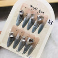 Wholesale Vendor Luxury Diamond Handmade French Long Almond Stiletto 10pcs Blue Cat Eye Magnetic Hand Painted Press on Nails