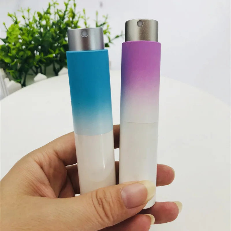 New Design Portable Mini 10ml Round Gradient Blue pink Purple Color Plastic Twist Spray Bottle for Travel
