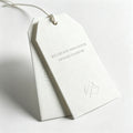 Custom Fashion Design Own Brand Embossed Logo Clothing Accessories Paper hang Tag for Garment