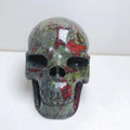 Wholesale Natural Hand Carved Realistic Crystal Skulls Dragon Blood Stone Skulls Carving Craft