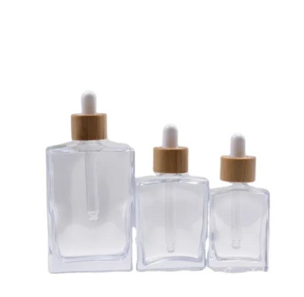 Fancy 30ml 50ml 100ml Square Cosmetic Clear Glass Dropper Serum Bottle With Bamboo Pipette Dropper