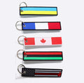 Cheap Custom Your Own Logo Flight Fabric Embroidery Jet Tags Woven Key Chains