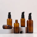 2025 Yiwu Competitive Wholesale Prices 5ml 10ml 15ml 20ml 30 ml 50ml 100ml Amber Glass Essential Oil Lotion Pump Bottle