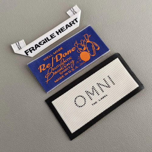 $0.19 for 1000pc Started Custom Design T Shirts Embossed Rubber Silicone Logo Damask Cloth Tags Satin Woven Labels for Clothing