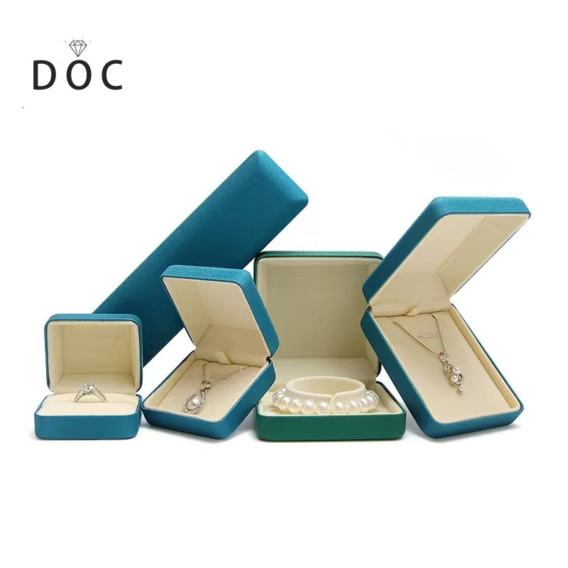 DOC Luxury Custom Logo Blue PU Leather Jewelry Packaging Box for Ring Pedant Bangle Necklace Boxes