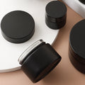Wholesale 1oz 50ml 2oz 4oz 8oz 250ml Cosmetic Container Face Body Cream Candle Glass Jar with Black Aluminum Lid