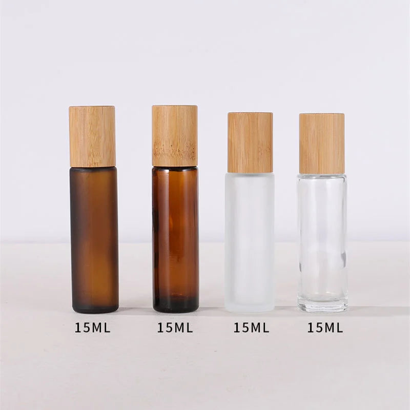 Skin Care Packaging 10ml 15ml Frosted clear Amber Oil Glass Roll on Bottle with Bamboo Wood Top Roller Ball Cap