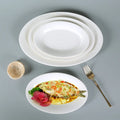 8/10/12/14 Inch Modern Eco-Friendly White Ceramic Oval Fish Dish for Restaurant and Hotel Use with Custom Logo