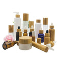 Wholesale 5ml 15ml 30ml 50ml 100ml clear Frosted Glass Skincare Jar Bamboo Containers for Cosmetics Glass Jar for Body Cream