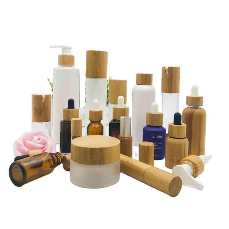 Wholesale 5ml 15ml 30ml 50ml 100ml clear Frosted Glass Skincare Jar Bamboo Containers for Cosmetics Glass Jar for Body Cream