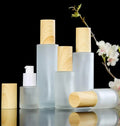 Empty 20ml 30ml 40ml 60ml 100ml Flat Shoulder Frosted Glass Lotion Bottle Perfume Spray Bottle Pump Bottles with Wood Grain Cap