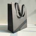 Custom Printing Black Shopping Paper Bags Luxury Gift Paper Bags Wholesale UV Logo for Clothing Jewelry Spa Store