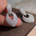 Huitan Silver Plated Micro Pave Hollow Water Drop 3A Luxury Crystal Zircon Bridal Earrings Diamond Drop Earrings for Women