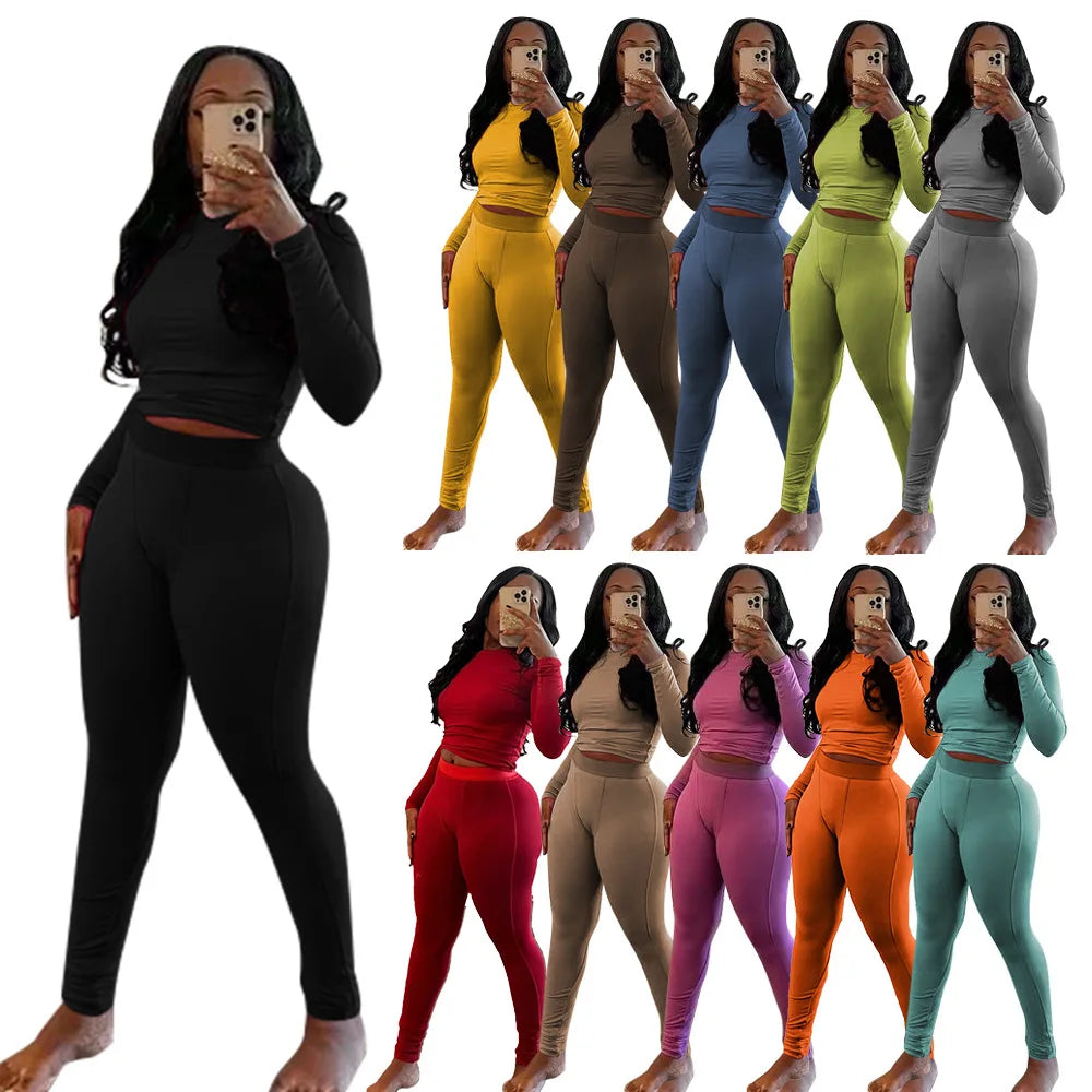New Sports Set Hot Selling Pit Strip Elastic Yoga Sports Women's Set Long Sleeved Tight Pants Two Piece Set