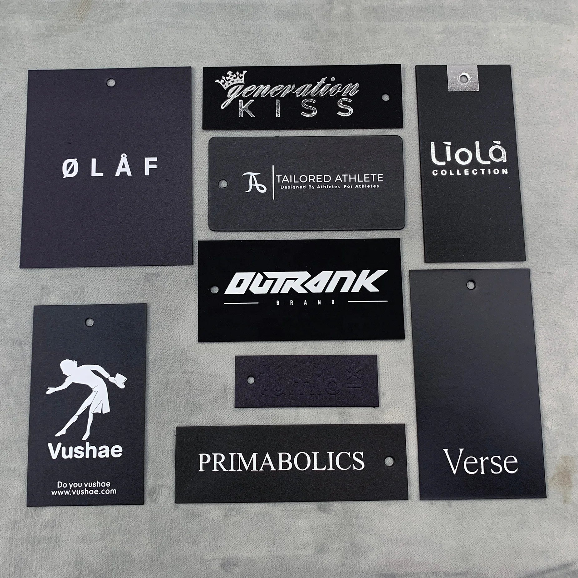 Wholesale Custom Luxury Embossed Garment Tags Golden Stamping Brand Logo Black Recycled Special Paper Hang Tag for Clothing