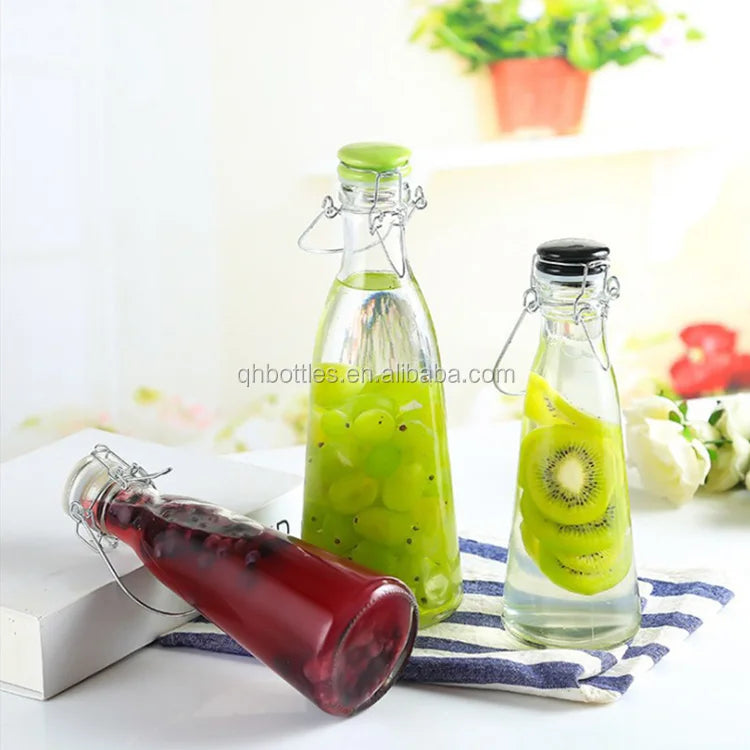 500ml 1000ml Clear Round Shape Juice Kombucha Tea Cold Soft Drink Beverage Glass Bottle With Ceramic Swing Top Clip Cap