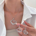 Hot Selling Vintage Fashion Trend Personality Alloy Diamond Necklace Set Hollow Pendant Earrings Heart Jewelry Set for Women