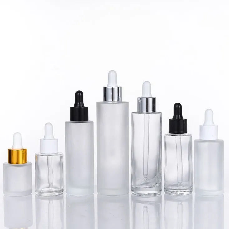 2026 Hot Sale 30ml 50ml 60ml 80ml 100ml clear Color  Round Cylinder Flat Shoulder Glass Dropper Bottle for Serum Essential Oil