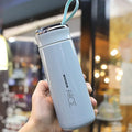 Custom Logo 400ml Cheap Price Double Wall Insulated Glass Water Bottle With Plastic Sleeve