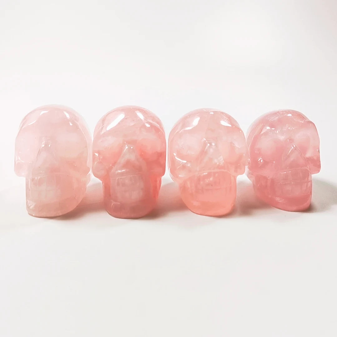 Huiying Decorative new style 2 inch carved rose quartz crystal stone skulls head for fengshui Crafts