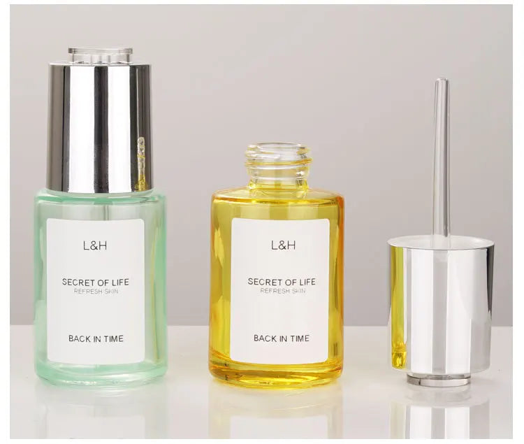 30ml Skin Care Serum Essence Cosmetic Glass Dropper Bottle with Rotary Switch Button Type in Stock