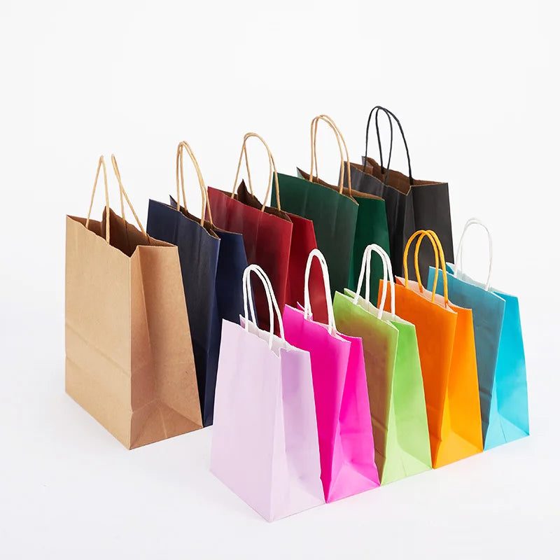 Wholesale Eco Reusable Biodegradable Carry Craft Boutique Gift Shopping Packaging pink Brown Kraft Paper Bag with Ribbon Handle