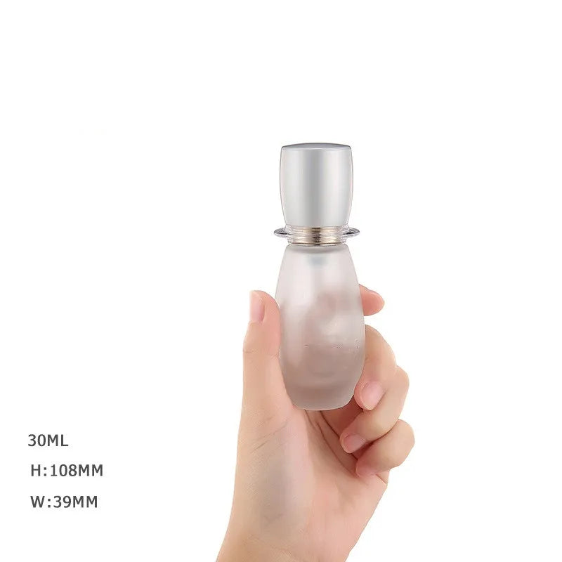 Custom logo 30ml Luxury Round Glass Foundation Bottles with Diamond Patch Cap for Make-up Production Cosmetic Package Container