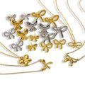 Fashion Jewelry Set Stainless Steel 18K Gold Hollow Bow Pendant Necklace and Earrings Set for Women