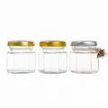 Top Seller 40ml 100ml Hexagon Food Storage Glass Honey Jar with Screw Lids Custom Logo Packaging