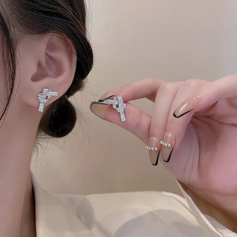 Korea Design Gold Plated Jewelry Micro Inlaid Zircon Full Diamond Hollow Knot Exquisite Long Stud Earrings for Woman