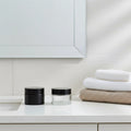 Wholesale 50g Clear Skincare Glass Cream Jar Round Shape Black Body Butter Glass Jar with Lids
