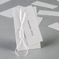 High Quality Low Price Hang Tags Free Design Recycled Eco-Friendly Paper Garment Clothing Hang Tags for Fashion Garment