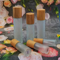 Stock Empty 15ml 30ml 50ml Eco Friendly Frosted Glass Bamboo Spray Serum Airless Pump Bottle Lotion Bamboo Wood Cover
