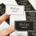 Wholesale Custom White Black Rectangle Adhesive Sticker Anti-Counterfeit Gift Boxes 'Thank You' Label for Exhibition Promotion