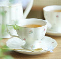 QIAN HU Top Sale English White Decal Ceramic Bone China Coffee Tea Cup Saucer Set Embossed Porcelain Mug Custom Real Gold Rim