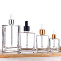 Custom Logo Clear Transparent Square Hair Oil Glass Serum Dropper Bottle Perfume Cosmetic Container 15ml 30ml 50ml 100ml