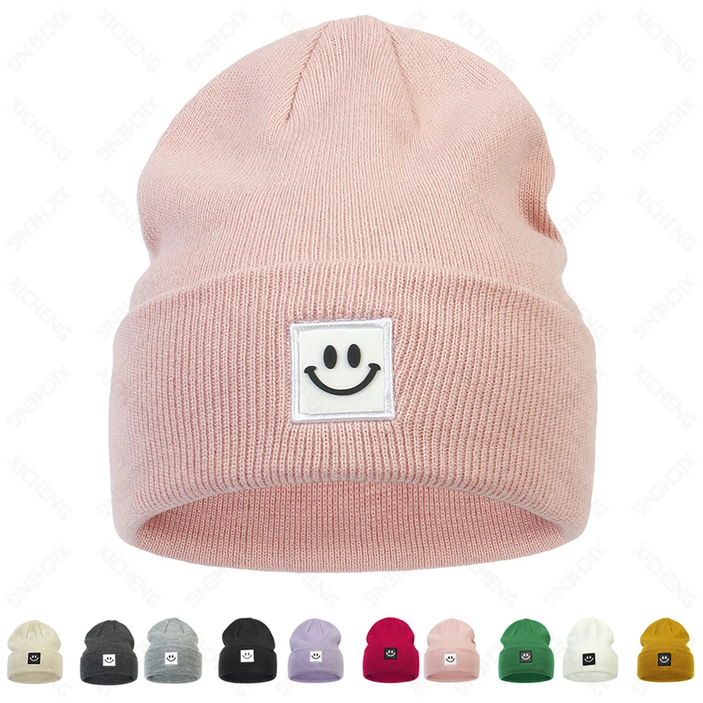 Factory Direct Custom logo Winter Warm High Elastic Acrylic Solid Color Cartoon Smile Embroidery Beanie Knitted Hat for Unisex