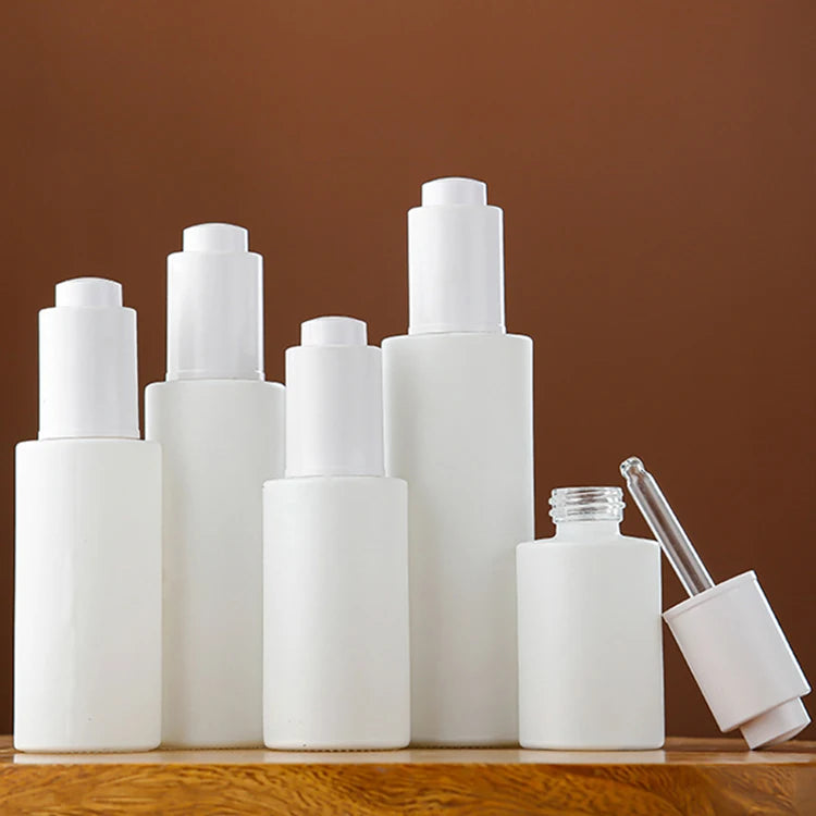 Customized White Glass Cosmetic Bottles for Lotion Serum Oil Cosmetic Package with Pressing Droppper Glass Bottles