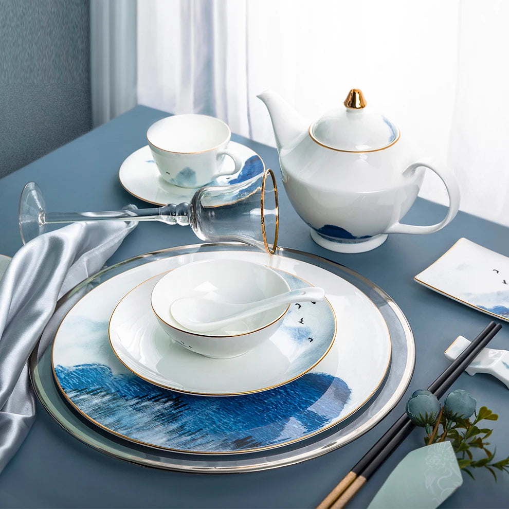 2022 Premium Chinese Scenic Design White Bone China Dinnerware Set With Gold Edge Rim